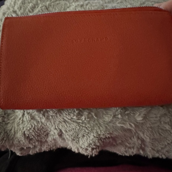 Longchamp Handbags - Longchamp Orange Leather Zip Wallet